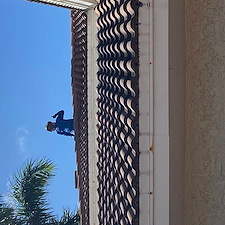 Perfect-two-story-home-roof-soft-wash-cleaning-in-port-Salerno-Stuart-Florida 4